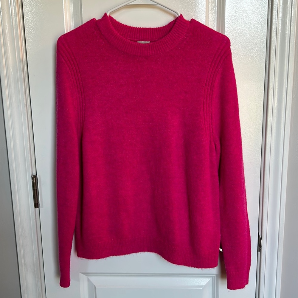 Hot pink, XS sweater that is slightly oversized for an XS